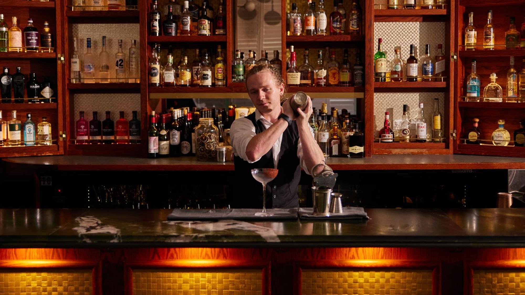 Ovolo The Valley Brisbane Eksteriør billede A bartender at work